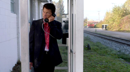 Cas calling Dean from North America's last working phone booth.